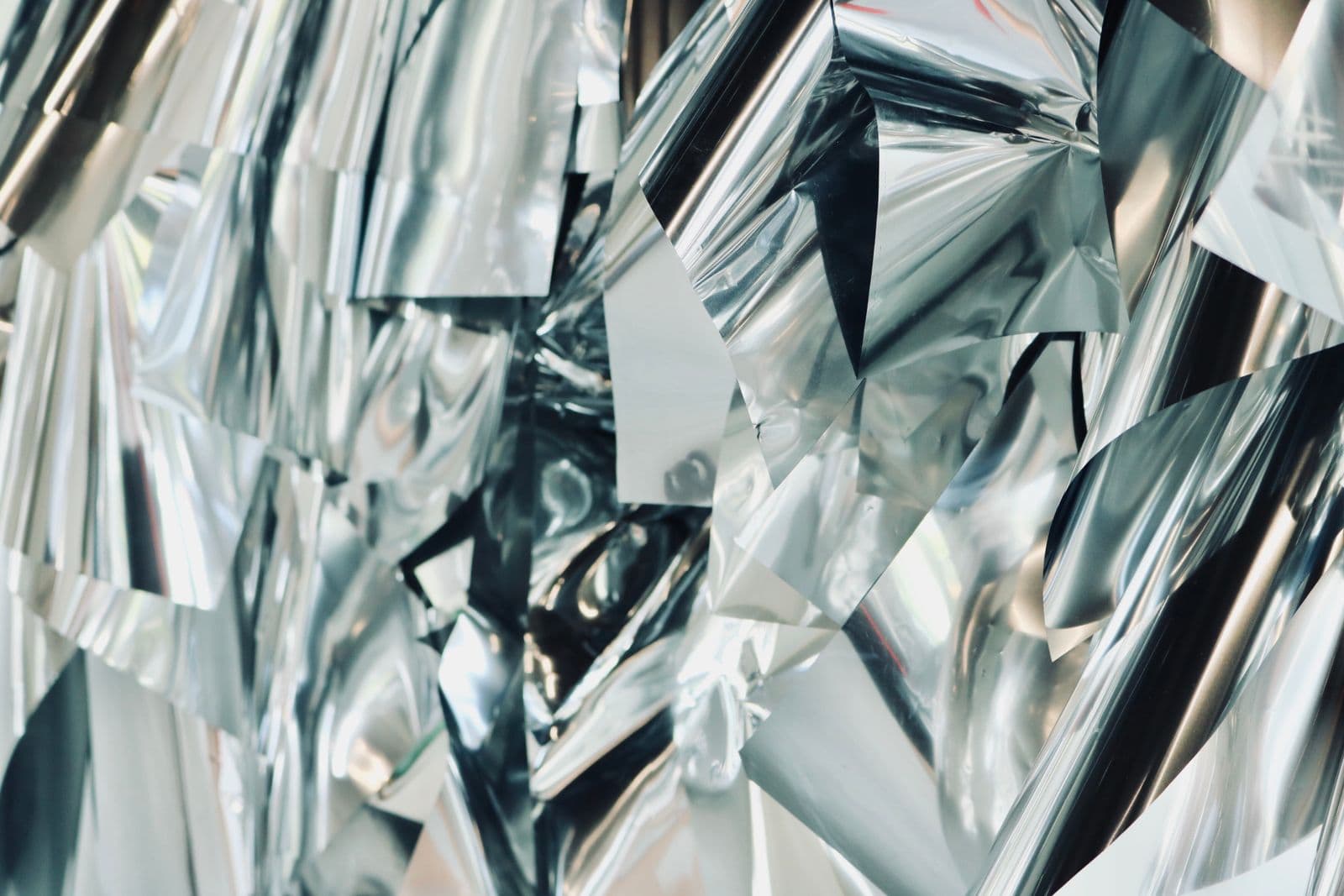 Close-up of crumpled metallic foil laminate